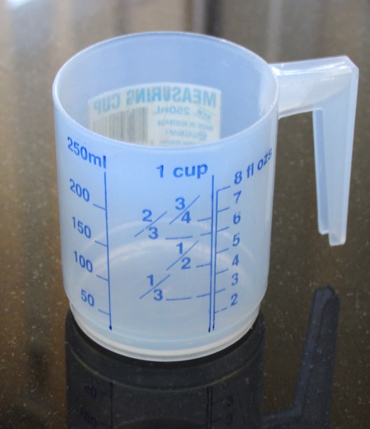 Illustration de repère : un récipient gradué pour une mesure en litre.